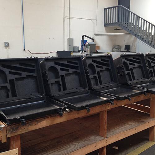 Row of SKB cases with foam inserts