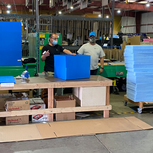 Short run custom plastic corrugated box being manufactured at Larson Packaging Company