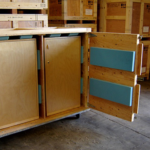 Foam lining stops the crate from damaging the cupboards. The swing door makes loading and unloading easy.