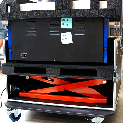 Custom made ATA case with inbulit scissor lift to lift the heavy piece of equipment out of the case.