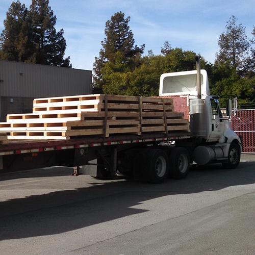 custom built pallets manufactured to specification on back of truck