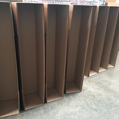 Row of custom made corrugated packaging boxes made by LPC