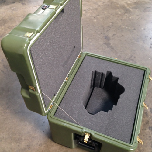 Green ATA case with multiple latches and custom fabricated foam insert