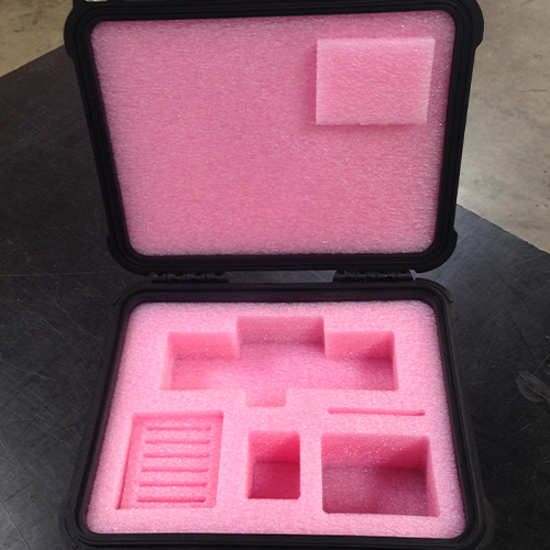 Molded case with ESD foam and cutouts for each component