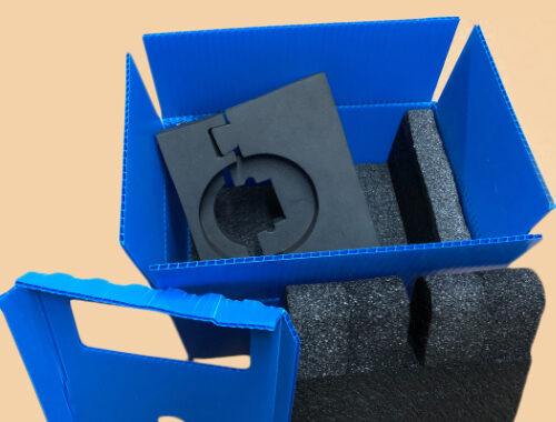 blue plastic corrugated box with black foam insert