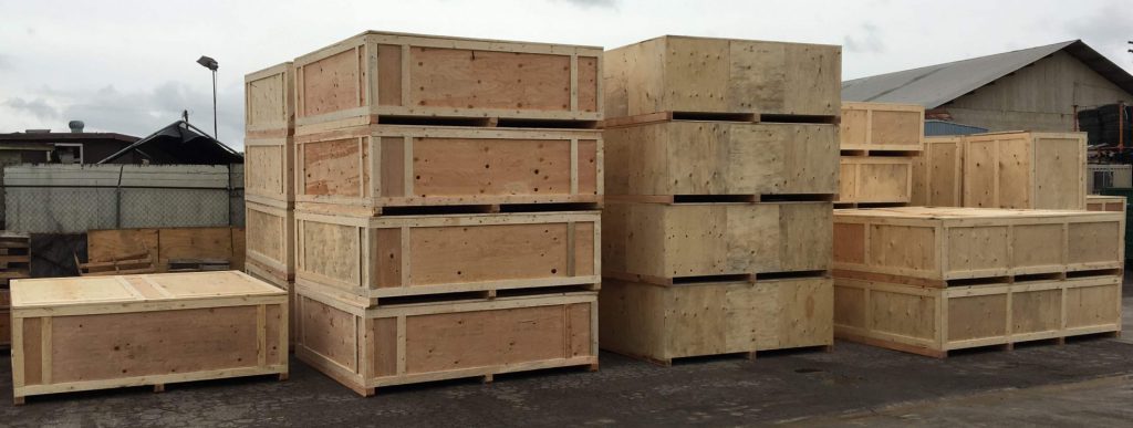 Stack of Mil-Spec standard wooden shipping crates ready to leave LPC manufacturing plant