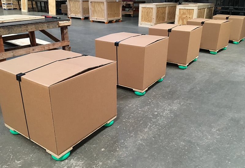 Hybrid wood and corrugated packaging solutions. Lighter weight and cheaper to make.